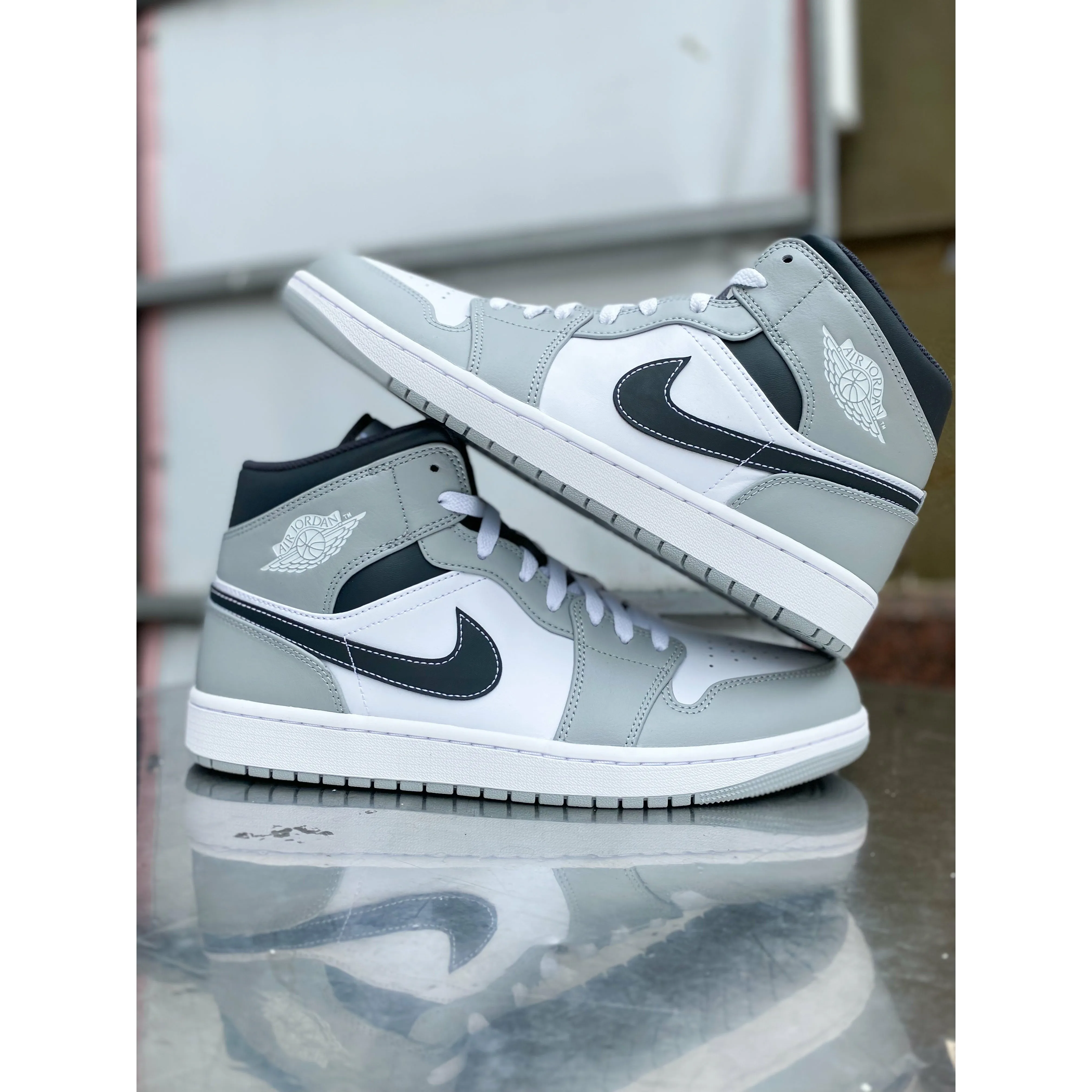Jordan 1 Mid Light Smoke Grey Anthracite running in a fumarole area shoes neoprene running shoes