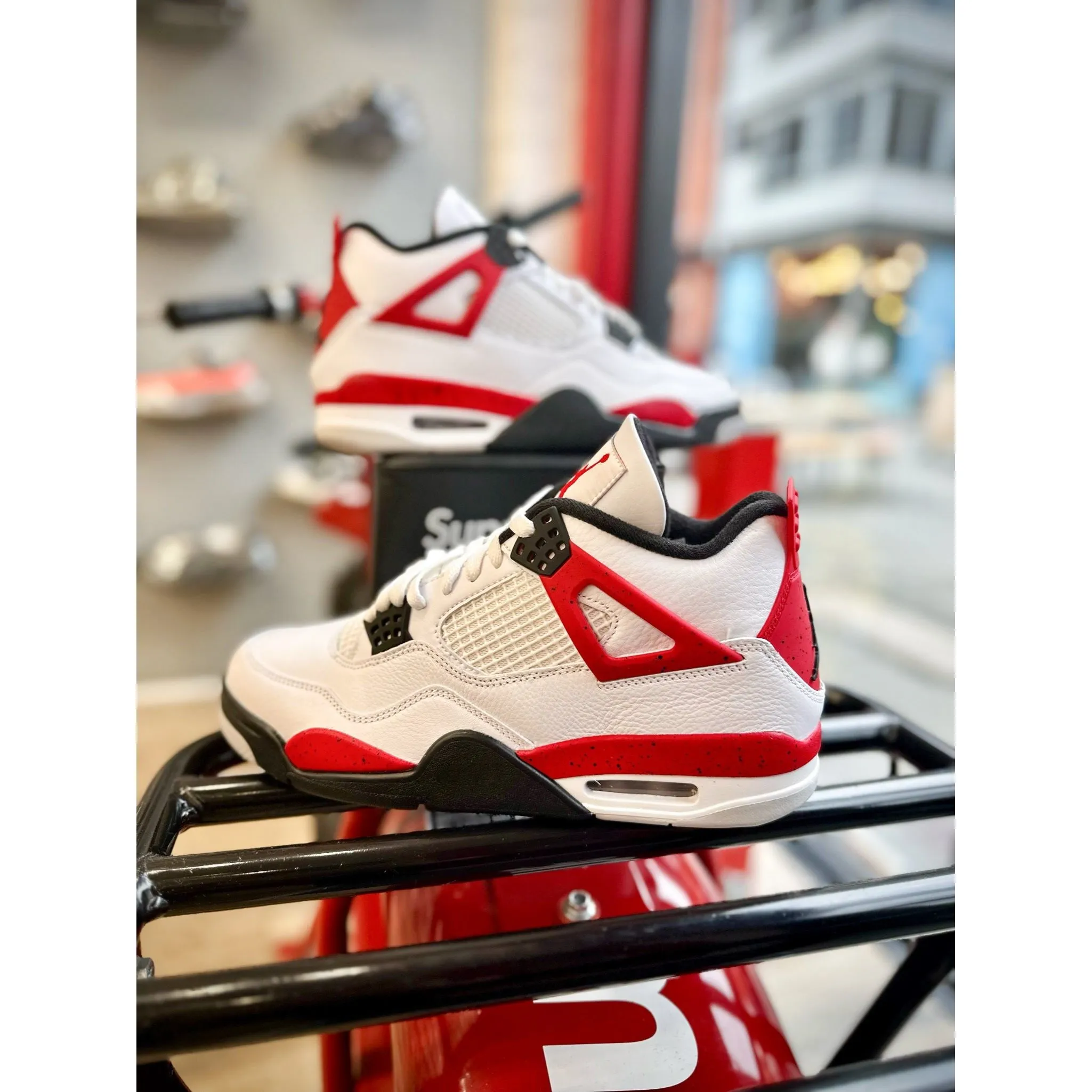 Jordan 4 Retro Red Cement running in international tracks shoes