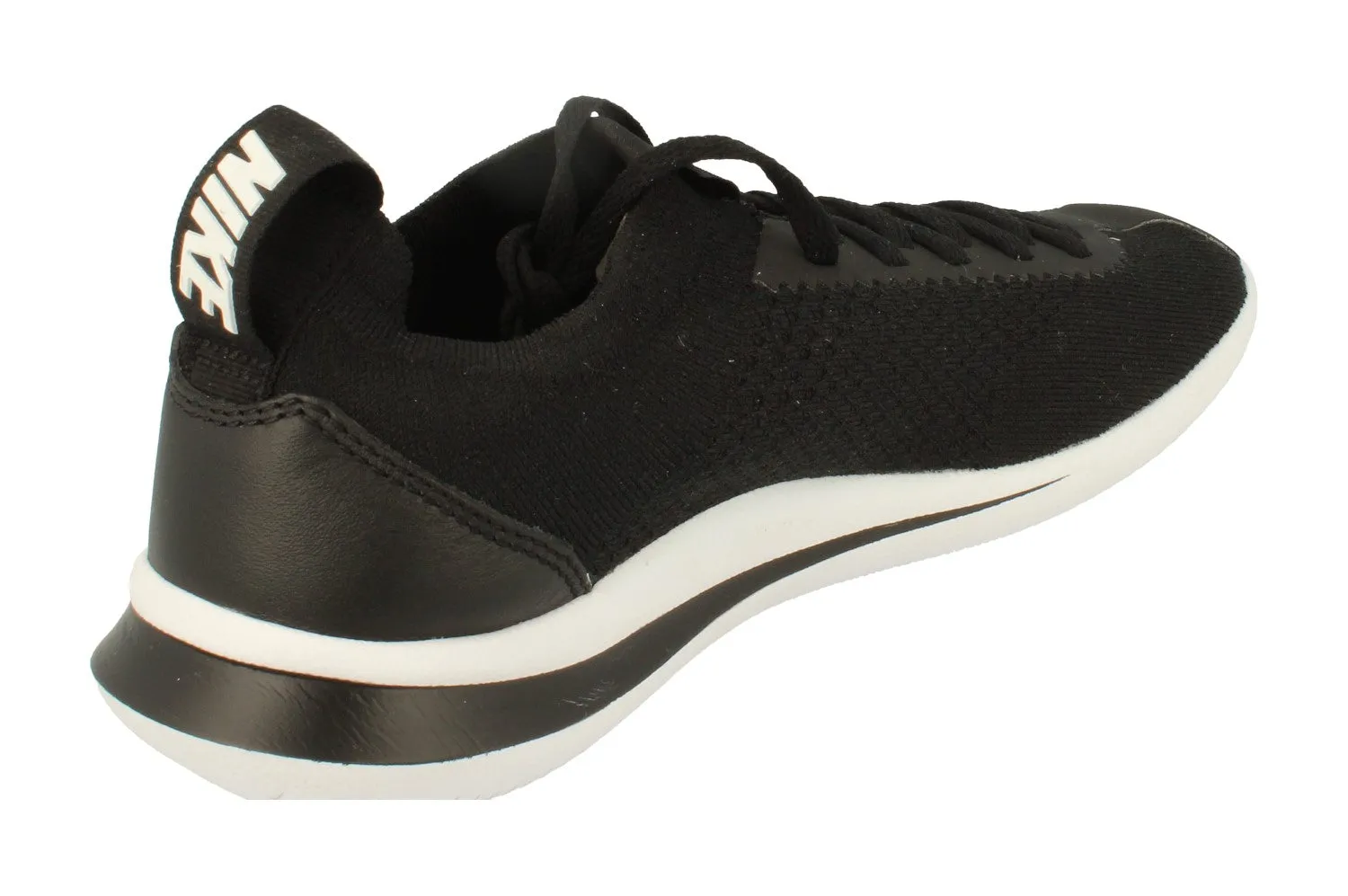 running on a rubber track shoes Nike Cortez Flyknit Mens AA2029 001