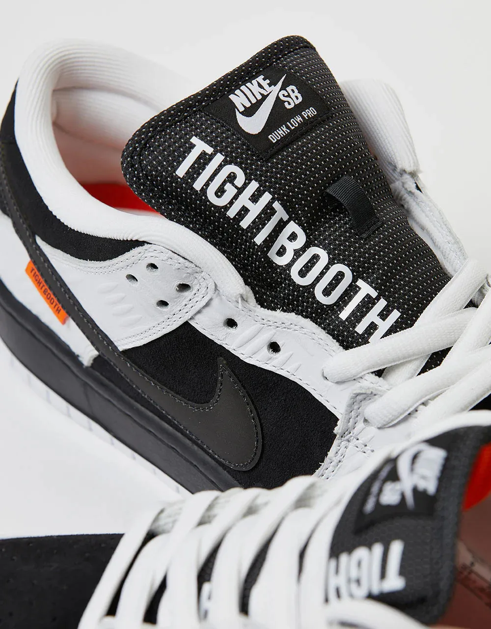 Nike SB 'Tightbooth' Dunk Low QS Skate Shoes - White/Black-Safety Orange Torsional Stability Plate Structured silhouette