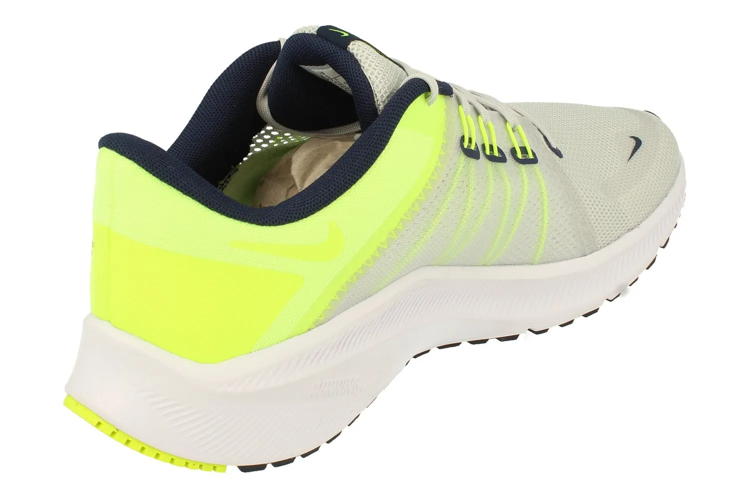 Nike Quest 4 Mens Da1105 003 running with a fitness tracker running in city