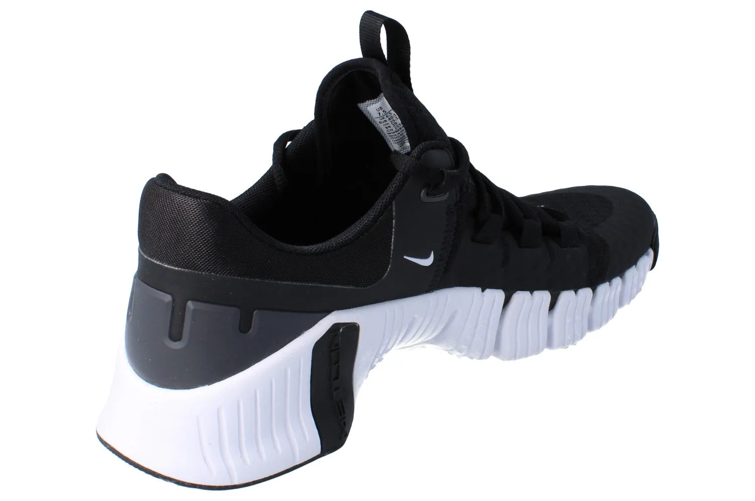 Nike Free Metcon 5 Mens Trainers DV3949 001 running with a hydration pack