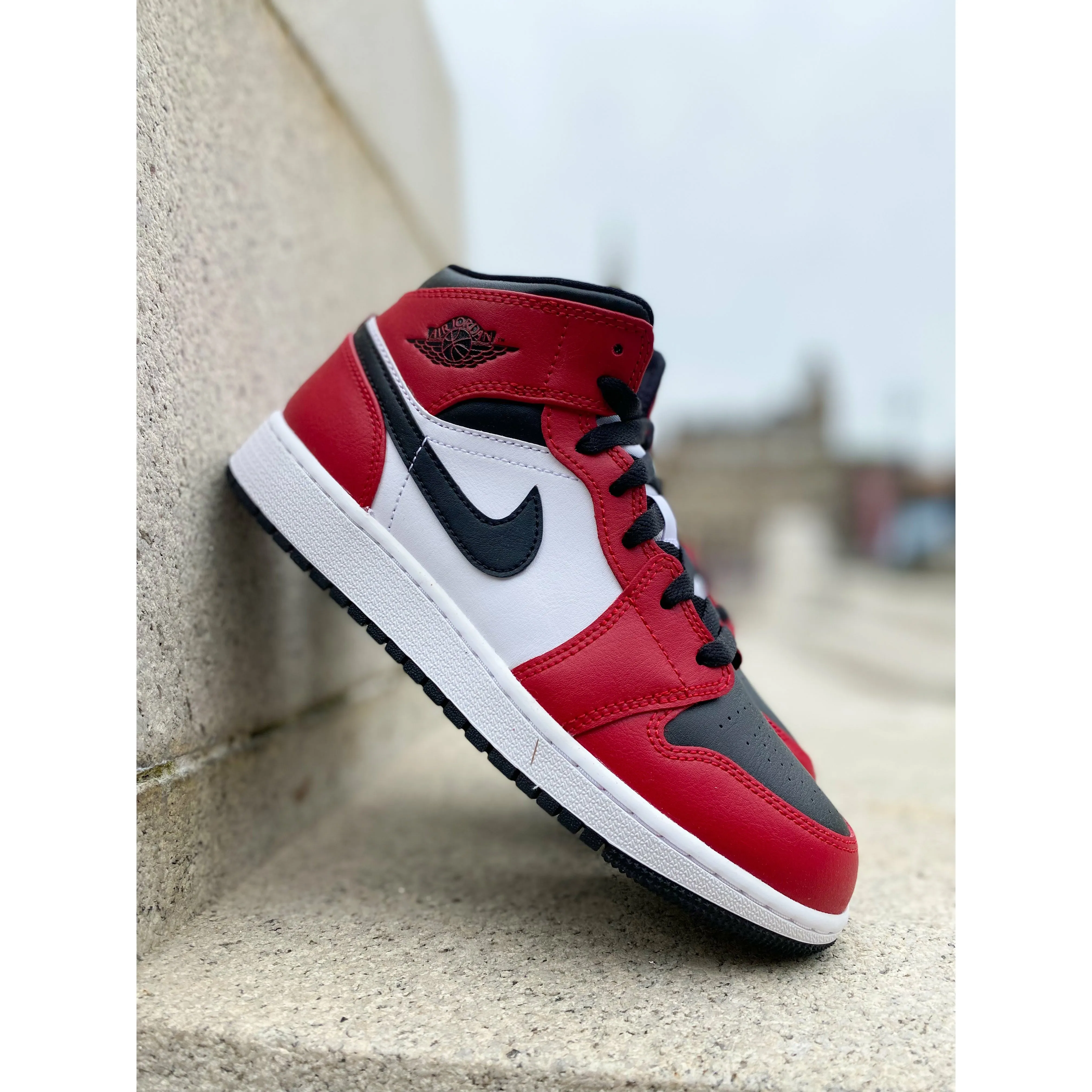running in city Jordan 1 Mid Chicago Toe