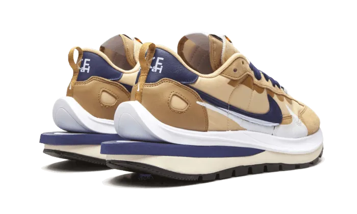 Vaporwaffle Sacai Tan Navy comedy - themed running shoes